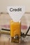 Credit sign on a cheese in mouse trap