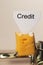 Credit sign on a cheese in mouse trap