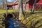 Creek running through a tunnel in the courtyard