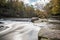 Creek with Silky Waterfall in Autumn