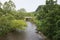 Creek view from overhead with trees.