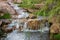 Creek Waterfall fowing with desert greenery