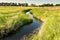 Creek winding through Kansas pasture