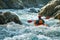 Creeking or whitewater kayaking in narrow river rapids