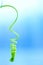 Creeper plant tendril against blue background