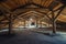 Creepy attic interior at abandoned building