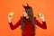 Creepy crawly. Happy little girl hold pumpkins orange background. Small child dressed up as creepy devil. Creepy look