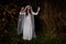 Creepy dead bride at night in a swamp. Halloween scene
