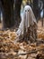 Creepy ghost walking in the autumn forest or park among yellow leaves, AI