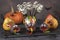 Creepy pear and fig monsters, mummy shaped chocolate cake pops and gummy worms for Halloween party, Halloween fruit and