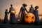 Creepy silhouette of unknown people with pumpkins in the graveyard