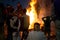 Cremation ceremony in Manikarnika Ghat on the Ganges River in Varanasi, People look at the funeral pyre