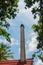 Crematorium chimney with green tree frame. Crematorium in Buddhist temple used to cremate a dead person