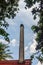 Crematorium chimney with green tree frame. Crematorium in Buddhist temple used to cremate a dead person