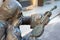 CREMONA, ITALY - MAY 24, 2016: The detail of bronze statue of Antonio Stradivari in front of his birth house