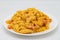 Creole Style Crawfish Macaroni and Cheese on a White Plate