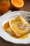 Crepe suzette, tasty pancakes with orange sauce on white plate, Generative AI