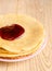 Crepes under cherry topping