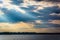 Crepuscular rays over the Back River seen from Cox Point Park, E