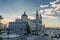 Crepuscular rays or Sunbaems sunset view of Madrid Cathedral Santa Maria la Real de La Almudena in Madrid, Spain.