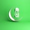 Crescent moon and arabic hanging lamp on green pastel background studio lighting.