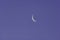 Crescent Moon On Clear Blue Sky