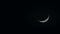 Crescent moon with clouds in the night sky