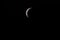 Crescent  moon  in dark  sky