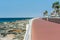 Crescent road and the breakwater and stones and background of Persian gulf in the Palm Jumeirah island in Dubai of the United Arab