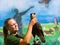 Crested caracara on hand of a trainer in a bird show