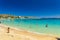 CRETE, GREECE - JULY 01 2023: Beautiful sandy beach and clear, shallow waters of Marathi near Chania in Western Crete (Greece