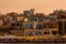 CRETE, GREECE - JULY 03 2023: Crowds of tourists gather at restaurants in the evening around the old Venetian harbour of Chania,