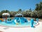 Crete, Greece - June 15th, 2017: Pool view panorama of colourful tropical kid s aquapark. Concept of relaxation and fun