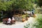 Crete, Greece - June 22, 2015: Wooden barrel of wine and table in outdoor cafe. Street cafes in Crete, Greece