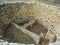 Crete, Greece - November, 2017: Pit for sacrifices, laid out with stones, the west courtyard of the Knossos palace