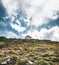 Crete, Greece, small unfinished church, amazing chapel abandoned in the mountains stones and rocks with blue sky, sunny