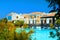 CRETE ISLAND, GREECE, JULY 01, 2011: View on Royal Mare Village restaurant for tourists, guests. Restaurant patio pool. Classical