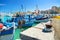 CRETE ISLAND, GREECE, SEP 12, 2012: View on beautiful classic old piscatory small sea boats ships, white yachts, Greek Heraklion s