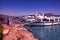 Crete or Kreta, Greece - September 14, 2017: Three ships docked with tourist and people grilling on mediterranean sea island