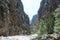 Crete, Samaria Gorge, very beautiful view of the mountains and small trees, stones, sand and hot sun