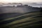 Crete senesi, rolling hills sunset. Tuscany, Italy