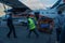 Crew of airline manage bags and passengers with police at Lukla airport