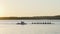Crew Team Boat Rowing At Sunrise