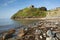 Criccieth beach Wales UK historic coastal town in summer with blue sky on a beautiful day