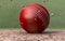 Cricket Ball Striking Ground With Particles