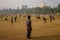 Cricket played on Oval maidan in Mumbai, India