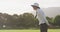 Cricket umpire making signs standing on a cricket pitch