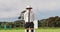 Cricket umpire making signs standing on a cricket pitch