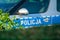 Crime, accident or strike concept. Polish police markings on the car. Police  polish =