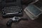 Crime fiction - old retro vintage typewriter and revolver handgun